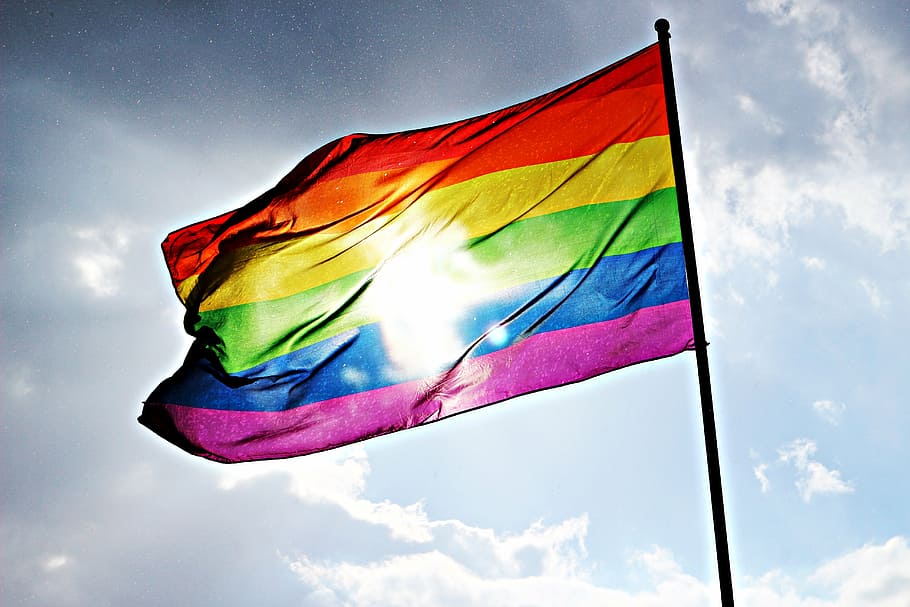 selective focus photography of LGBT flag, rainbow, sun, sky, pride, HD wallpaper