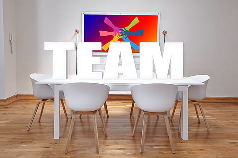 TEAM free standing letter on white wooden table taken on lighted room HD wallpaper