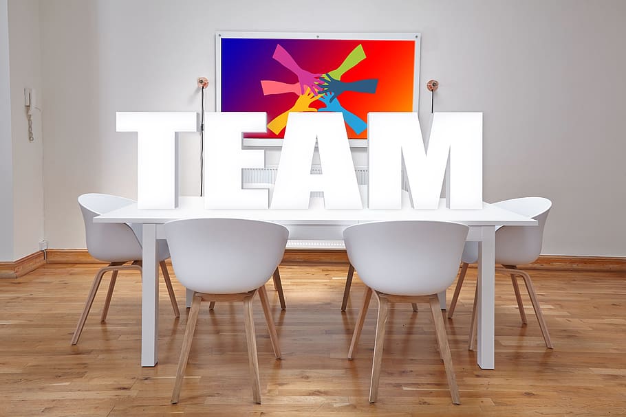 TEAM free standing letter on white wooden table taken on lighted room HD wallpaper