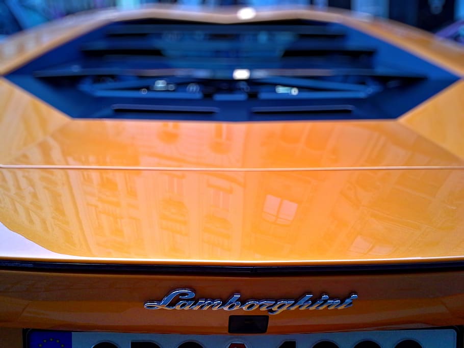 close-up photo of orange Lamborghini Aventador, brno, racing car