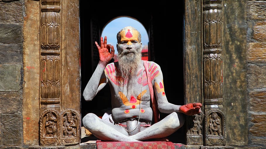close up photo man in red body hand paint sitting in door, cultures HD wallpaper