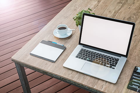 MacBook Pro on brown wooden table, turned on, laptop, notebook HD wallpaper