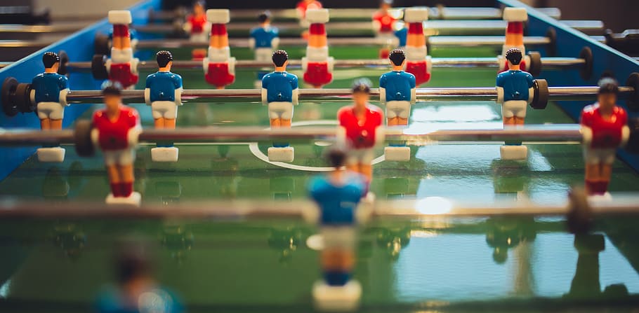 close-up photo of green and blue foosball table, blur, game HD wallpaper