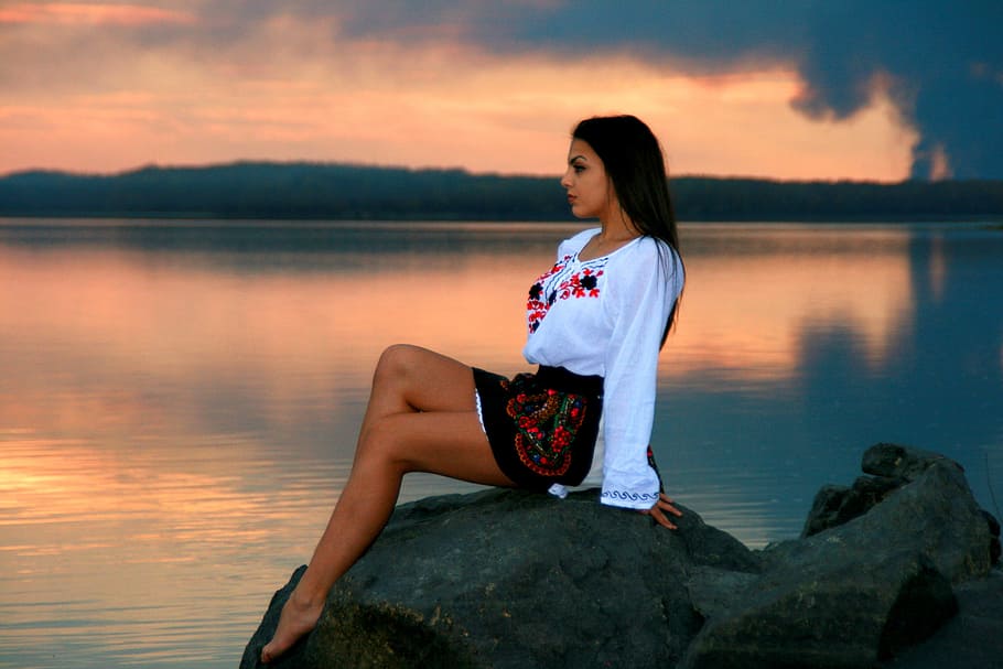 woman in white top sitting on rock near body of water, girl HD wallpaper