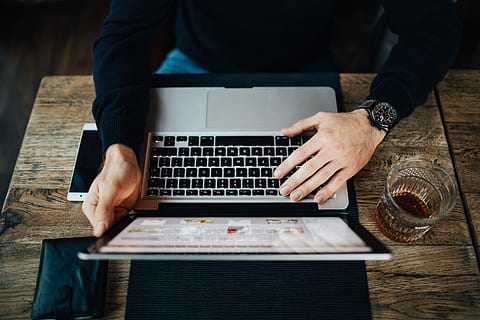 Young Entrepreneur Working from a Modern Cafe, interior, workspace HD wallpaper