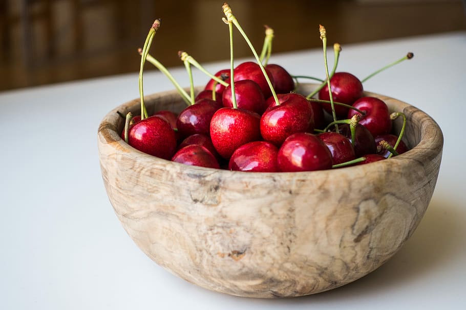 Fresh cherries in a wooden bowl, close up, fruit, healthy, red