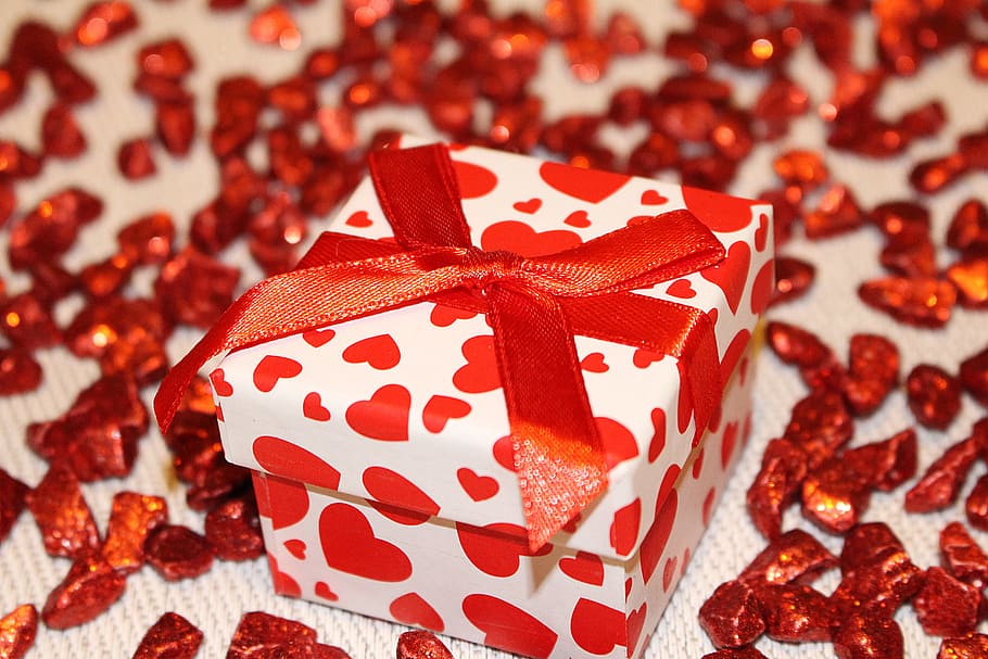 white and red heart print box with bow on white textile, loop HD wallpaper