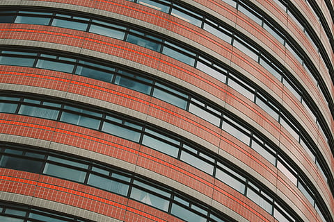 red and clear concrete glass building low angle photography, architectural photography of building HD wallpaper