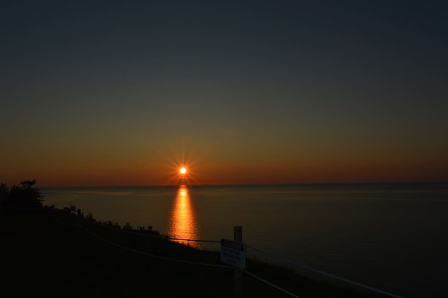 lying sun, nature, evening, sky, sunset, water, scenics - nature HD wallpaper
