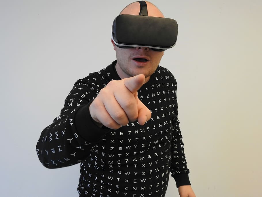 man wearing VR headset, pointing, virtual reality, one person HD wallpaper