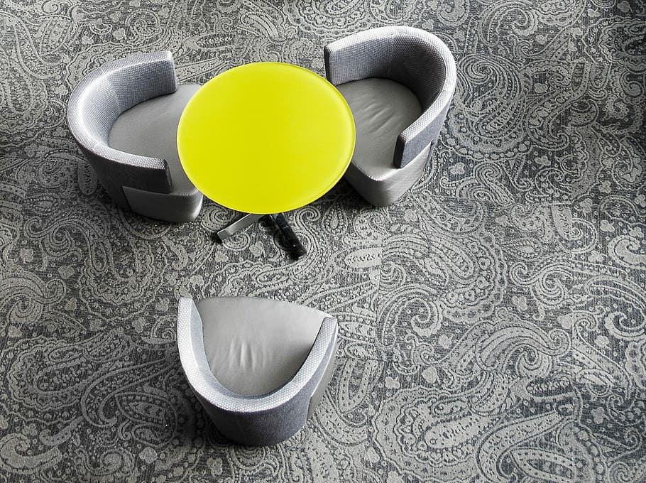 round yellow glass top table three silver tub chairs set, high angle view of table and chairs on carpet HD wallpaper