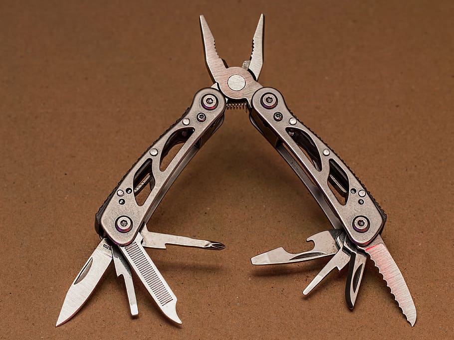 grey handled multi-tool, pliers, pocket knife, multifunction