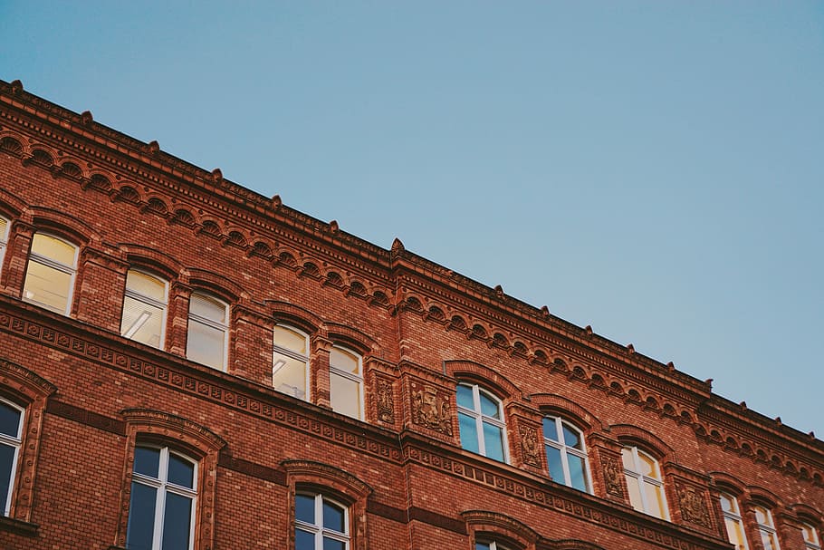 low angle photography of brown building, low angle photography of brown high-rise buildin during daytime HD wallpaper