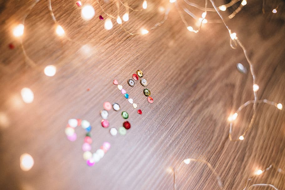 2017 beads with string lights, after, background, bokeh, celebration HD wallpaper