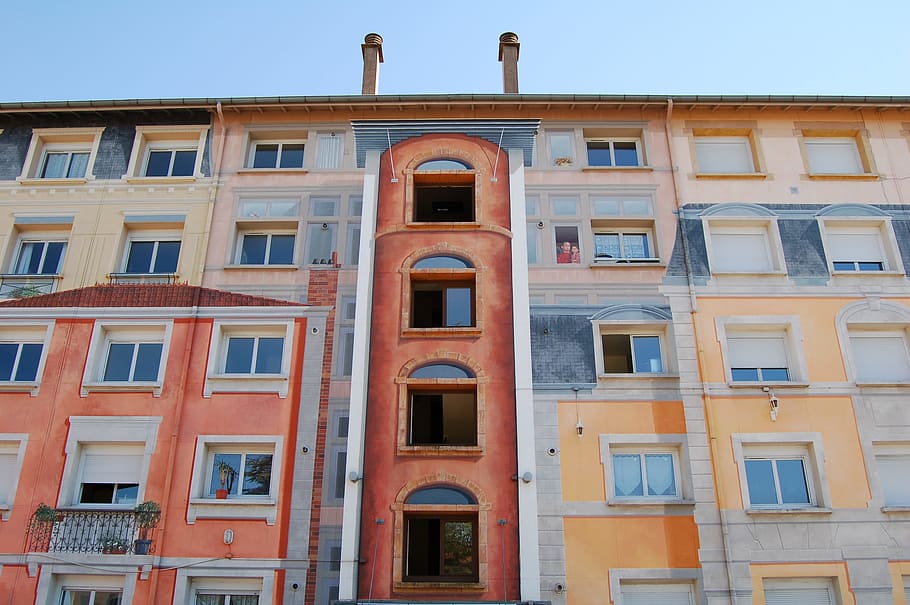 low-angle photography of brown and beige building, photo of pink and brown painted building HD wallpaper