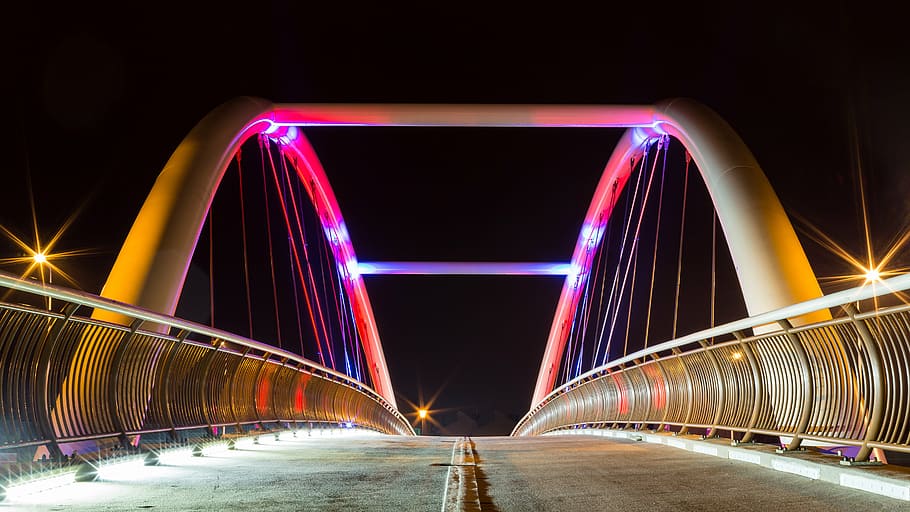 photo of empty suspension bridge, lighted, arc, nightime, architecture HD wallpaper