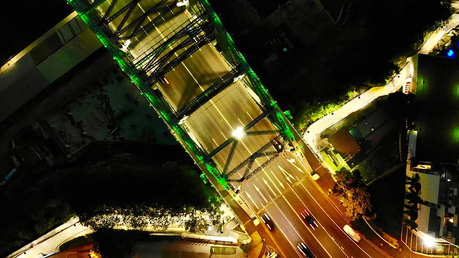 timelapse photography of cars on city road during night time, aerial view photography of cars moving on road toward brige
