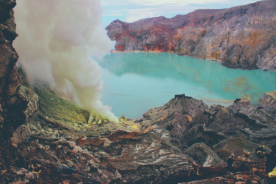 Kawah Ijen, volcano steam vents on rock formations, crater, crater lake