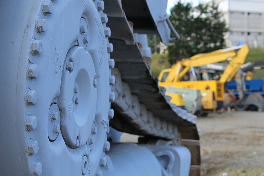 machinery, blue, caterpillar, bolts, focus on foreground, day HD wallpaper