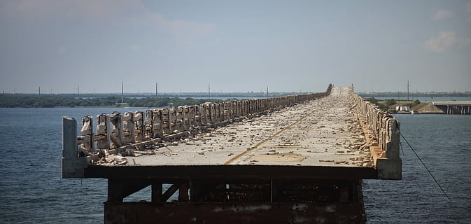 unfinished gray concrete bridge during daytime, destroyed, leave HD wallpaper