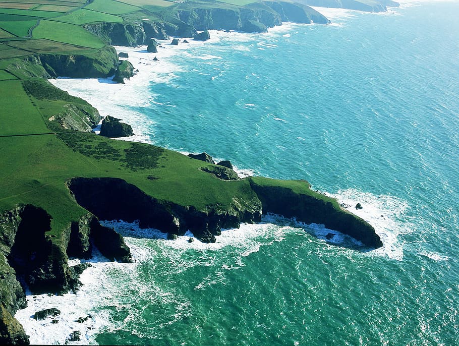 body of water beside green field, aerial photography of island HD wallpaper