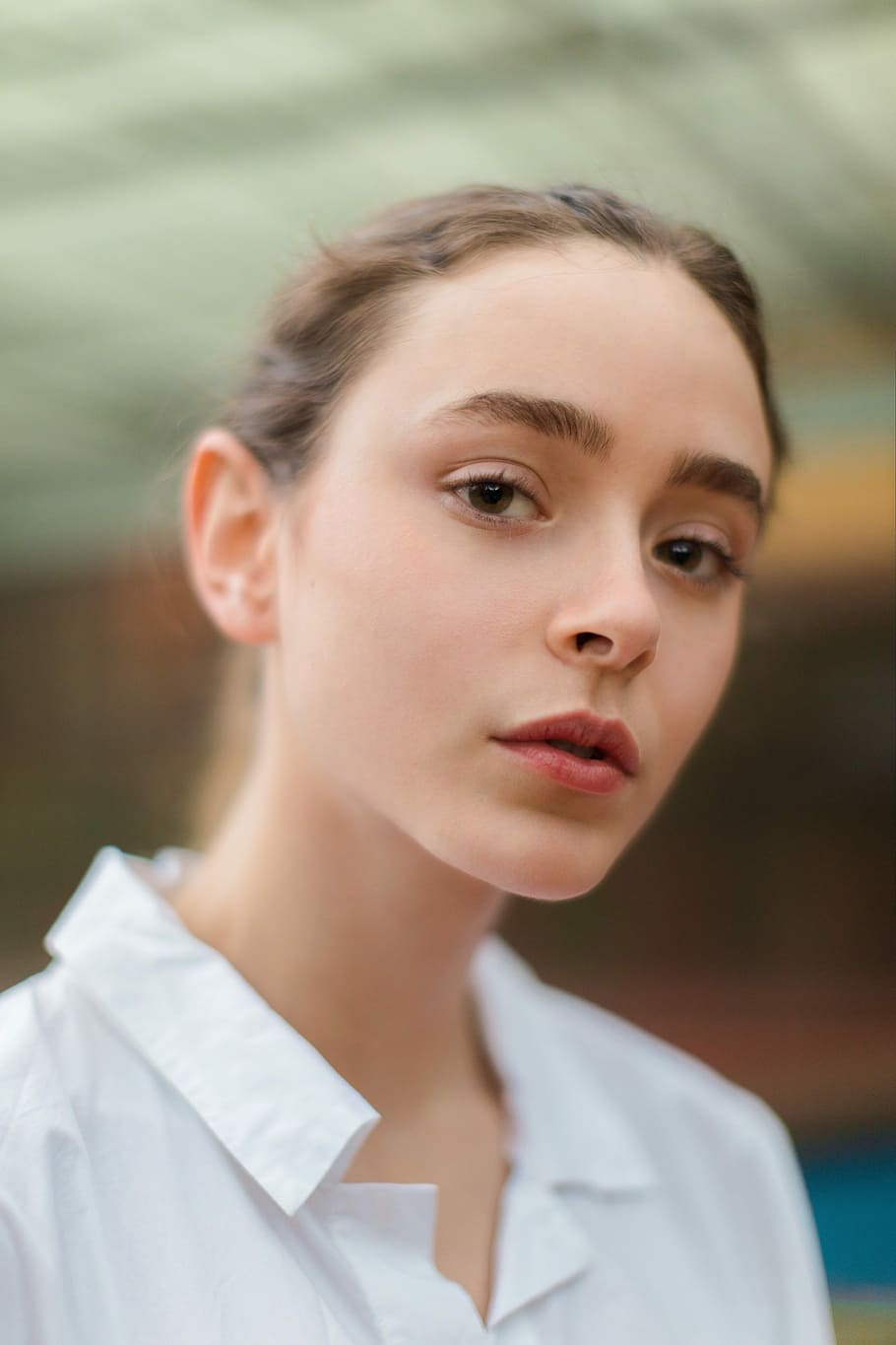 woman wearing white collared top, person, 50mm, canon, model