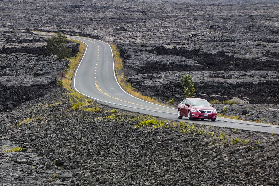 The S Curve, red sedan on gray concrete top road near black stones HD wallpaper