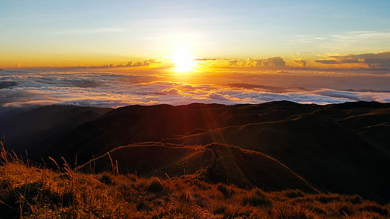 Mount Pulag Sunrise, silhouette photo of mountain during golden hour HD wallpaper