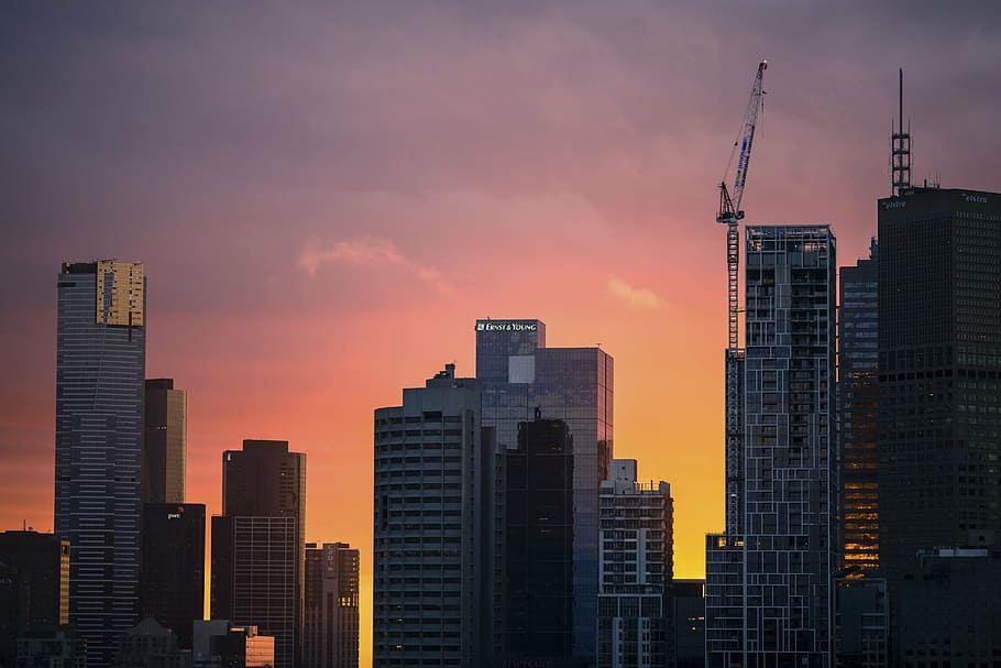high-rise buildings under orange sky, architecture, infrastructure HD wallpaper