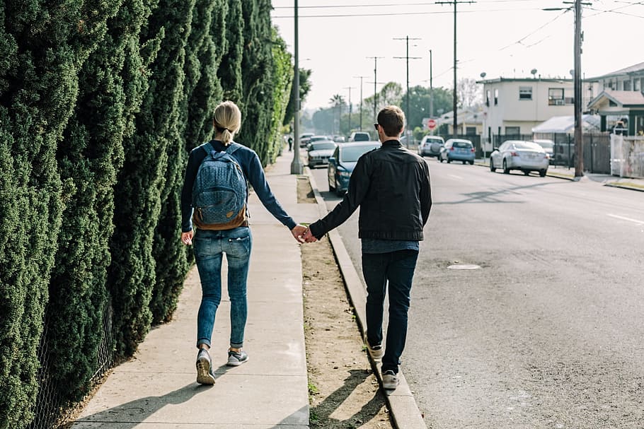 woman and man walking on sidewalk while holding hands, couple, HD wallpaper