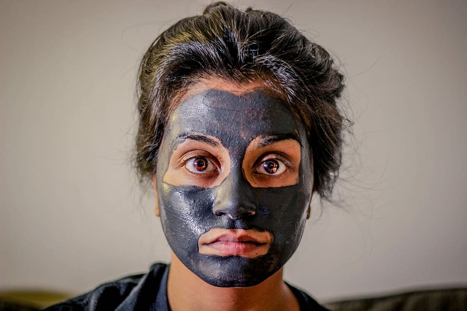 woman with gray facial mask, woman applying face mask, portrait HD wallpaper