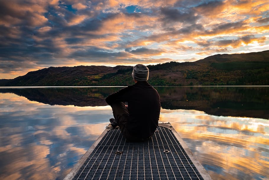 person sitting on dock, bridge, front, green, mountain, body HD wallpaper