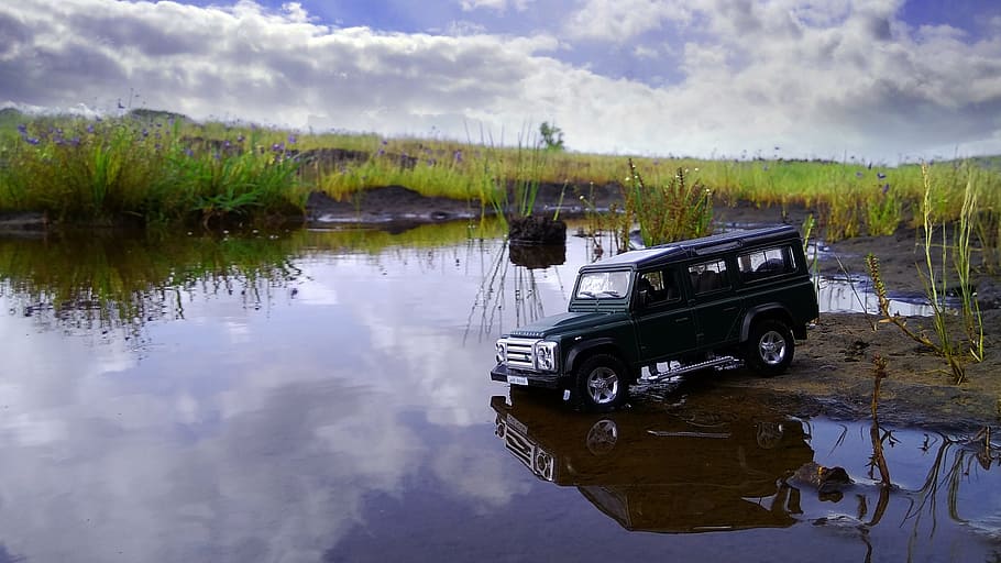 black vehicle beside body of water, photography, creative, creativity HD wallpaper