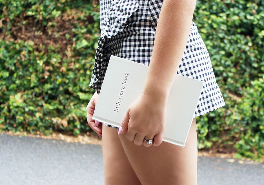 woman holding Little White Book book, summer, outdoors, nature, HD wallpaper