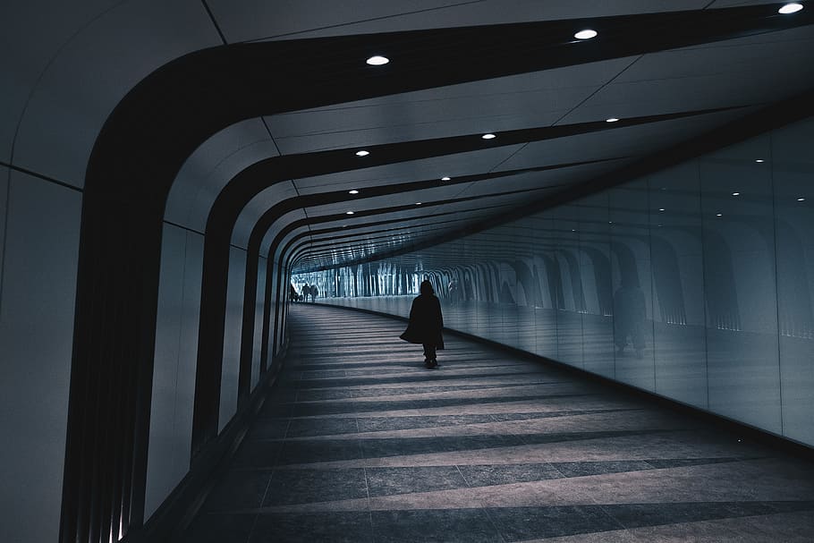 Person walking in modern city tunnel, architecture, people, corridor, HD wallpaper