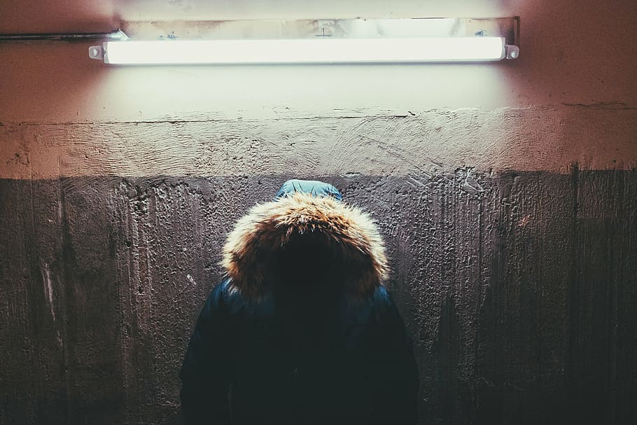 blue and brown coat hanged on wall, person, standing, fluorescent HD wallpaper