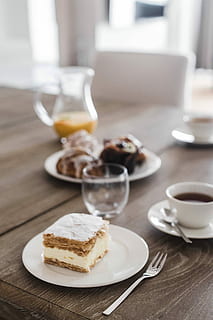 Sweet dessert with cream and a cup of coffee on a table, cake HD wallpaper