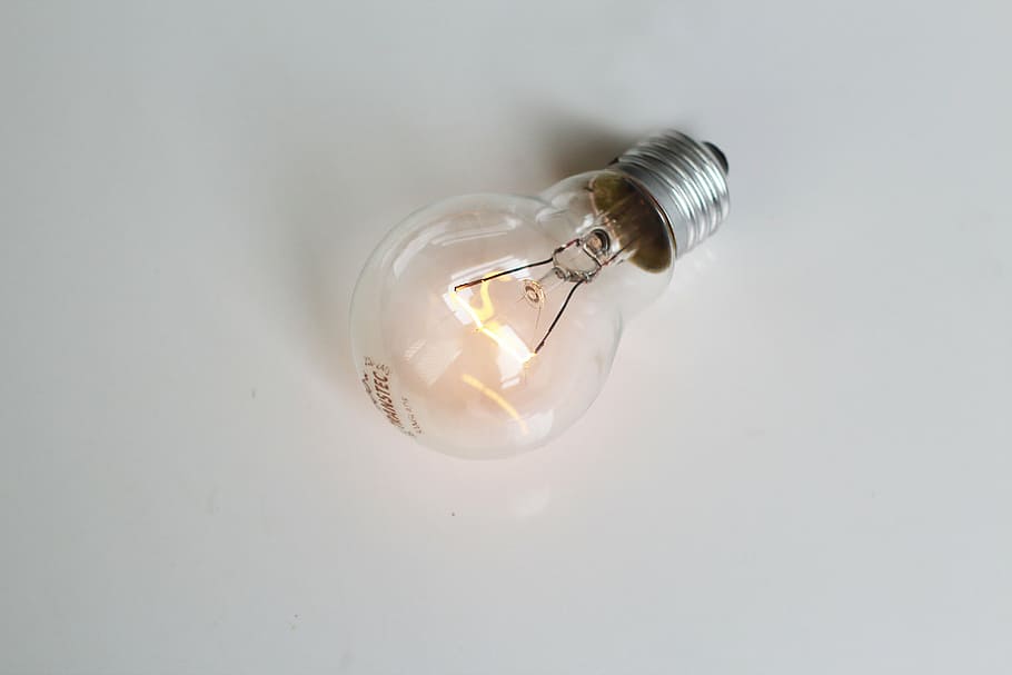 incandescent light bulb, close up, glowing, bright, electric