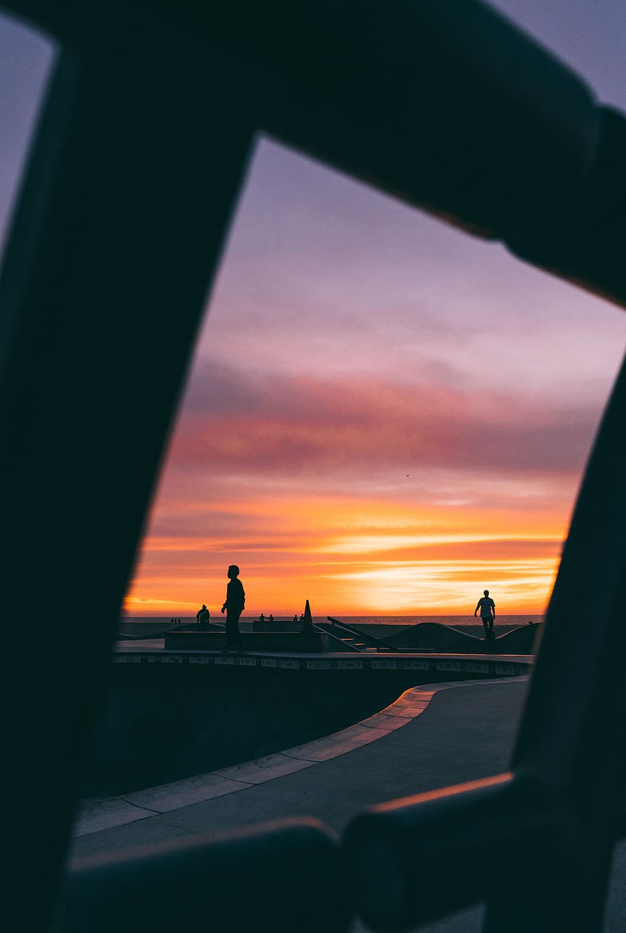 Sunsets in Venice Beach., silhouette photo of people walking during golden hour HD wallpaper