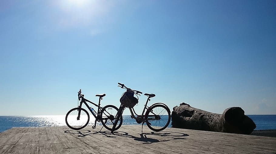 two mountain bicycles on dock, taiwan, pingtung, sunshine, hai bian