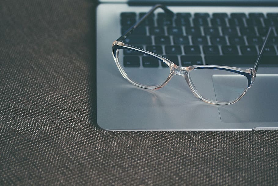 clear framed eyeglasses on MacBook Pro, translucent, laptop HD wallpaper