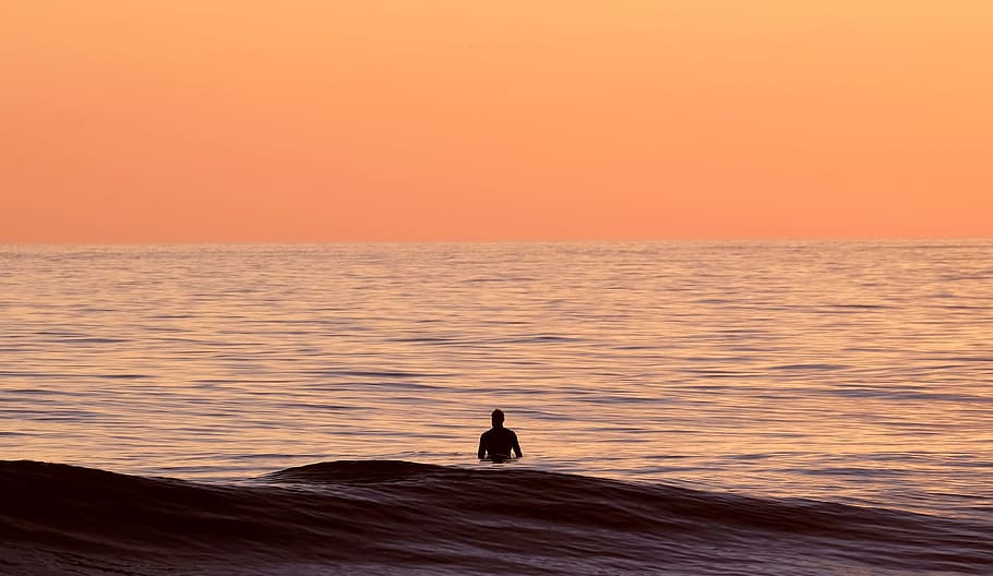 silhouette of person in body of water, silhouette of man in body of water during daytime HD wallpaper