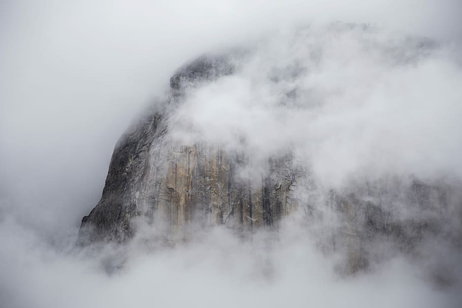 mountain covered with clouds, mountain surrounded by clouds, mist HD wallpaper