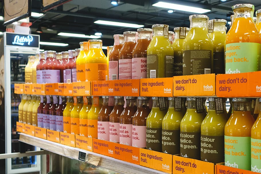 1360x768px | free download | HD wallpaper: Fruit juices in supermarket,  grocery store, healthy, retail, bottle | Wallpaper Flare