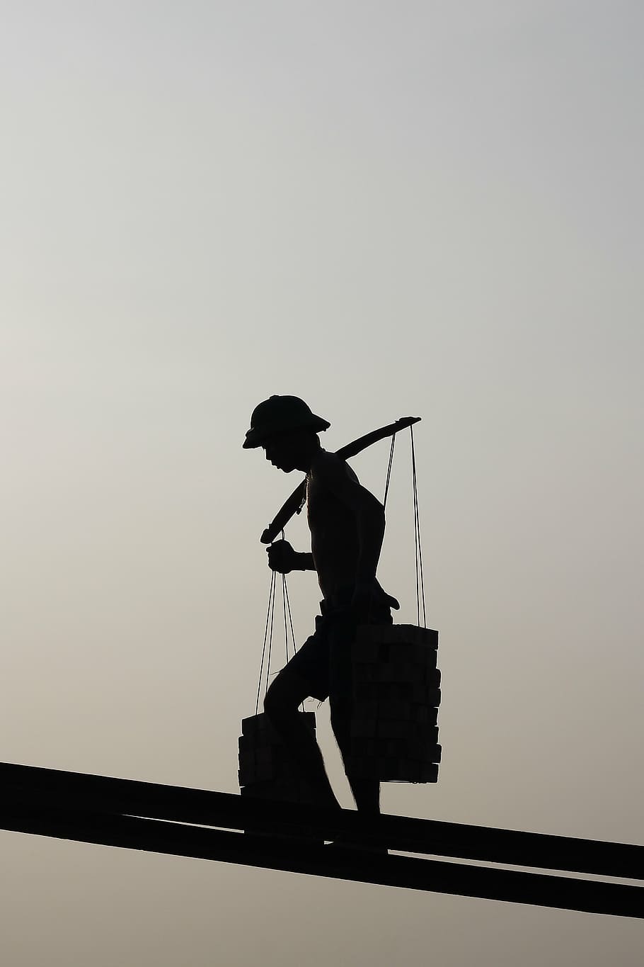 silhouette of man walking on stick, stones, background, work HD wallpaper