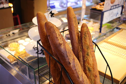 four baguettes on black metal rack, bread, bakery, white bread HD wallpaper