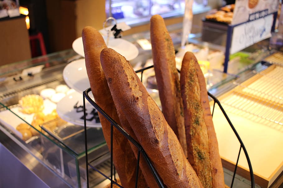 four baguettes on black metal rack, bread, bakery, white bread HD wallpaper