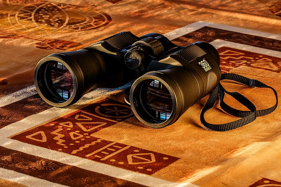 black binoculars on mat, birdwatching, spy glass, spying, dawn