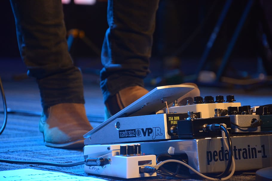 person standing in front of guitar amplifier, Concert, Music