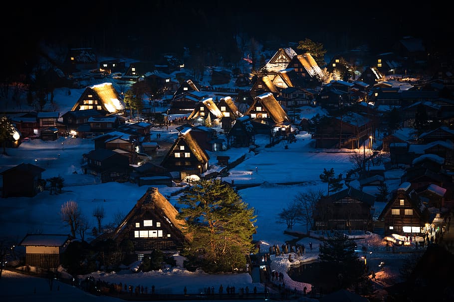snow covered town with lights during night time, japan, shirakawa-go